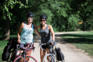 girls with bikes on trail